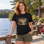 Woman wearing Camp Lifer tee at a lakeside camp