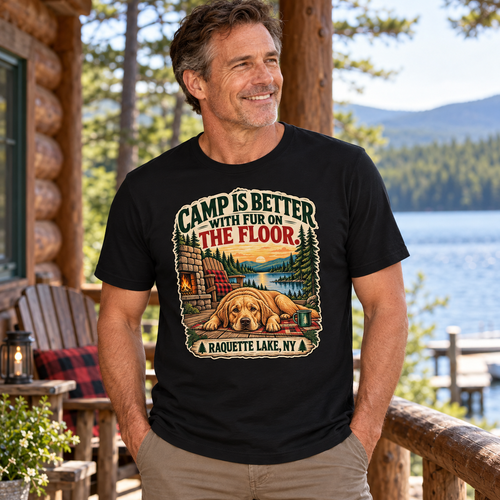 AI-generated lifestyle mockup of a man in his 50s wearing the black Camp Is Better With Fur on the Floor tee.